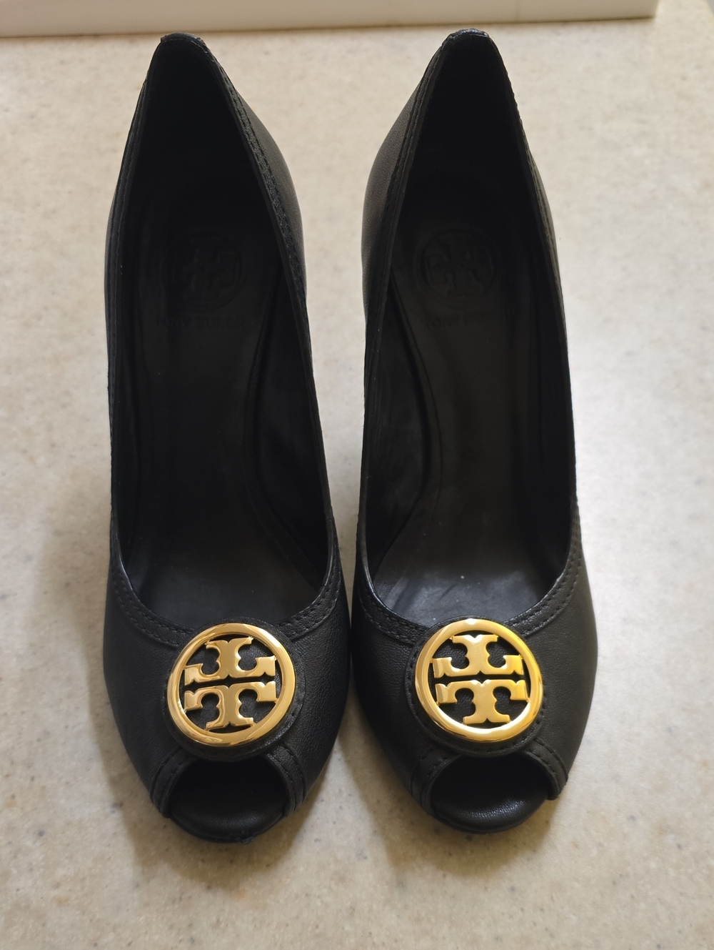 Tory Burch Black Peep-Toe Pumps with Gold Logo Medallion